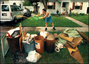 A home owner deals with the aftermath of a flood